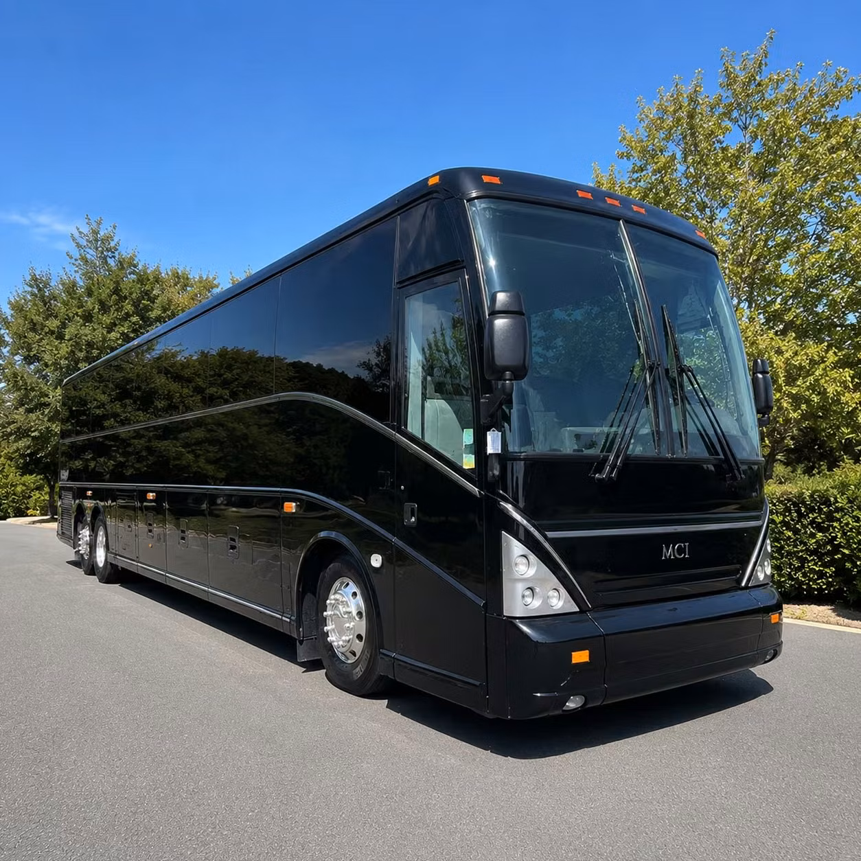 orange sports team fan bus rentals
